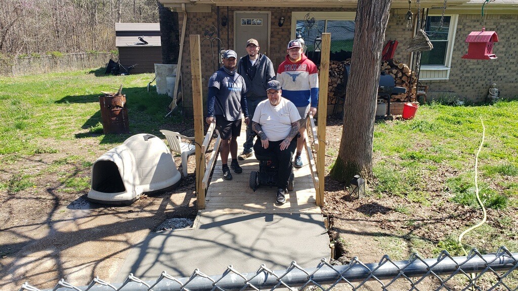 Wheelchair ramp installation crew.